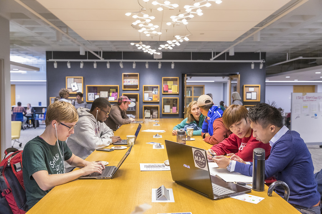 Students doing research in the library.