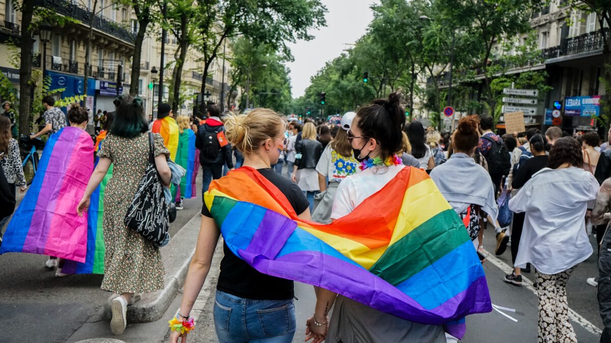 People walking in a pride parade.
